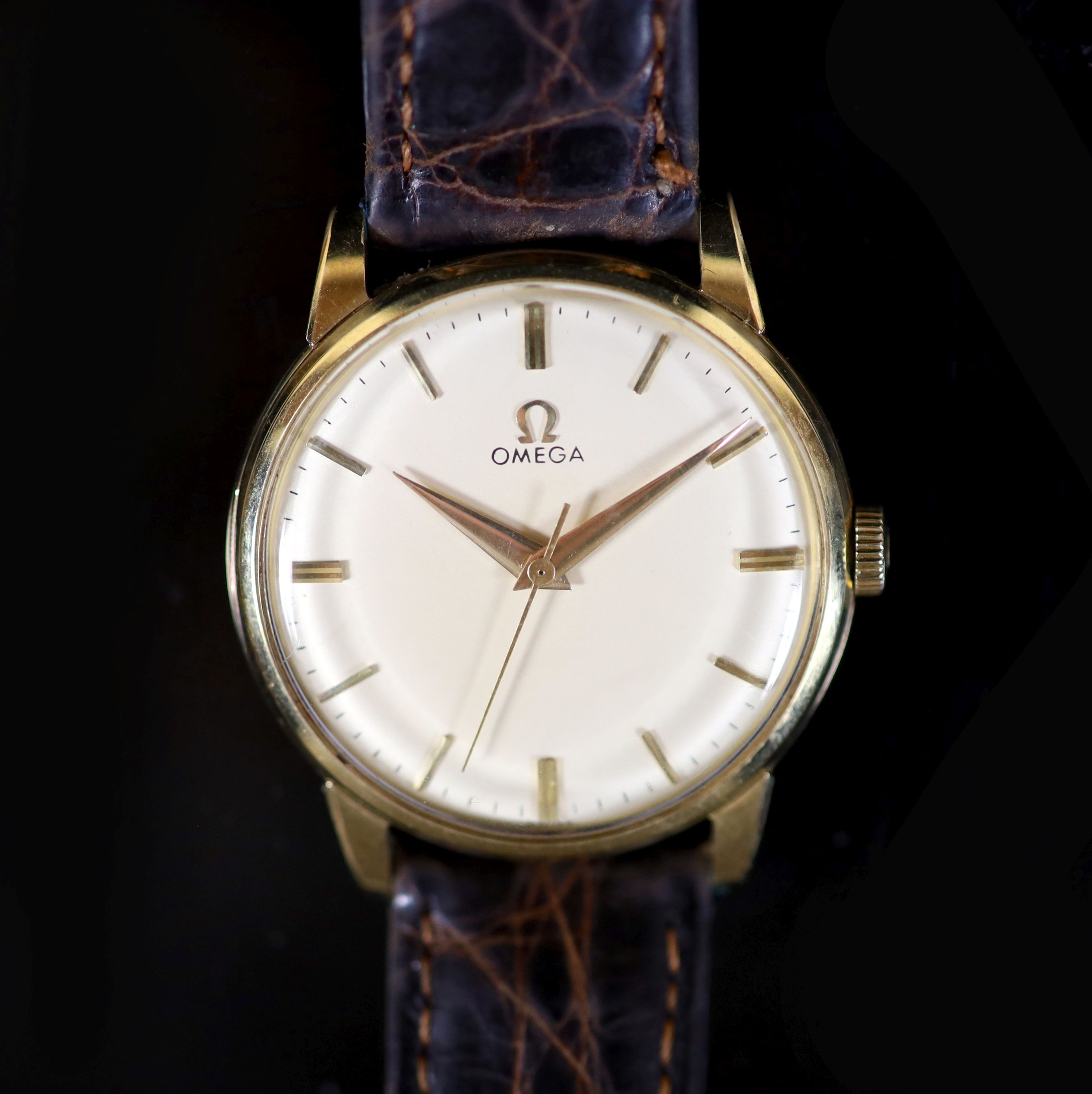 A gentleman's late 1950's 14ct gold Omega manual wind wrist watch